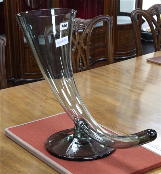 A glass cornucopia vase